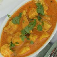 40. Chicken Curry · Chicken cooked in house curry sauce and spices. Served with basmati rice.