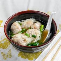 71. Pork Bamboo Dumpling Soup · Savory soup with dumplings. 