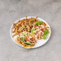 9. Uncle Willies · Fried chicken soft taco, cheese, lettuce, bacon with maple aioli with golden fries.