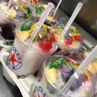 Halo-Halo · Halo-halo is a popular Filipino iced dessert, literally means “mix-mix”.  As its name implie...