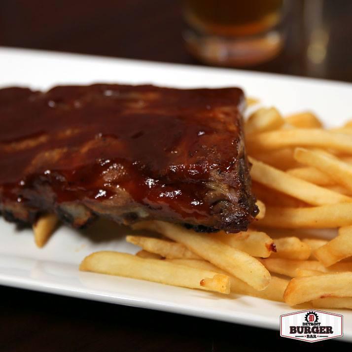 Baked BBQ Baby Back Ribs · Seasoned ribs slow roasted in our signature BBQ sauce and served with french fries.