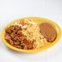 Carne Guisada · Tender beef tips in savory natural gravy and served with tortillas.