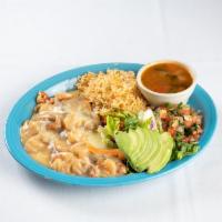 Pollo a la Costa · Seafood sauce with crawfish and shrimp on top of 10 oz. of chicken breast. Served with pico ...