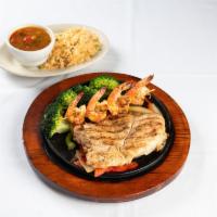 Cancun Platter · Hearty grilled chicken breast with a grilled shrimp kabob on a bed of steamed broccoli. Serv...