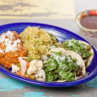 Carne Asada · Choice of 2 tacos with onion, cilantro on handmade tortillas, choice of rice and beans or Pe...