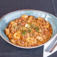 Jimmy's Jammin' Jambalaya · Cajun rice loaded with shrimp, chicken and andouille sausage simmered in a spicy broth.