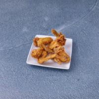 F1. Fried Chicken Wings · 4 pieces. Alas fritas. Cooked wings of a chicken coated in sauce or seasoning.