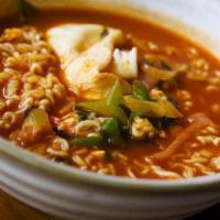 Spicy Ramen with Dumpling · A spicy ramen noodle soup with thin noodle, egg and dumpling.