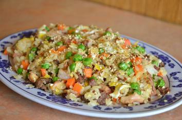 Chicken Fried Rice · Pan-fried veggies and choice of your protein, and our secret spice blend.