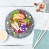 Sashimi Appetizer · 7 pieces of assorted sashimi.
