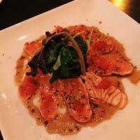 Salmon Tataki  · Sliced seared salmon with scallion, tobiko, and ponzu sauce.