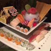 Sushi and Sashimi Combo · 6 pieces sushi, 16 pieces sashimi, California roll, and New York roll.