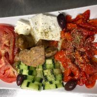 Mediterranean Feast · Italian sausage, feta cheese, tomatoes, cucumbers, Kalamata olives and roasted red peppers s...