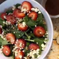 Baby Spinach Salad · Baby spinach, goat cheese, strawberries, walnuts and homemade balsamic raspberry vinaigrette...