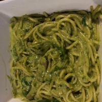 Spinach Pesto Pasta · Fresh spinach, sauteed mushrooms, Parmesan cheese and a creamy pesto sauce. Vegetarian.