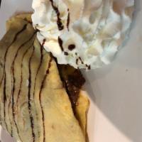 Chocolate Monkey Crepe · Nutella, banana  with a side of vanilla ice cream.