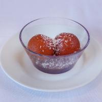 Gulab Jamun · Dumplings traditionally made from thickened and reduced milk soaked in rose flavored sugar s...