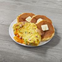 Denver Omelette · This classic is filled with your choice of cheese, diced ham, onions and green peppers saute...