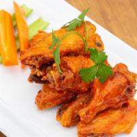 Buffalo Wings · Jumbo wings served in sauce of your choice. Choose small or large order.