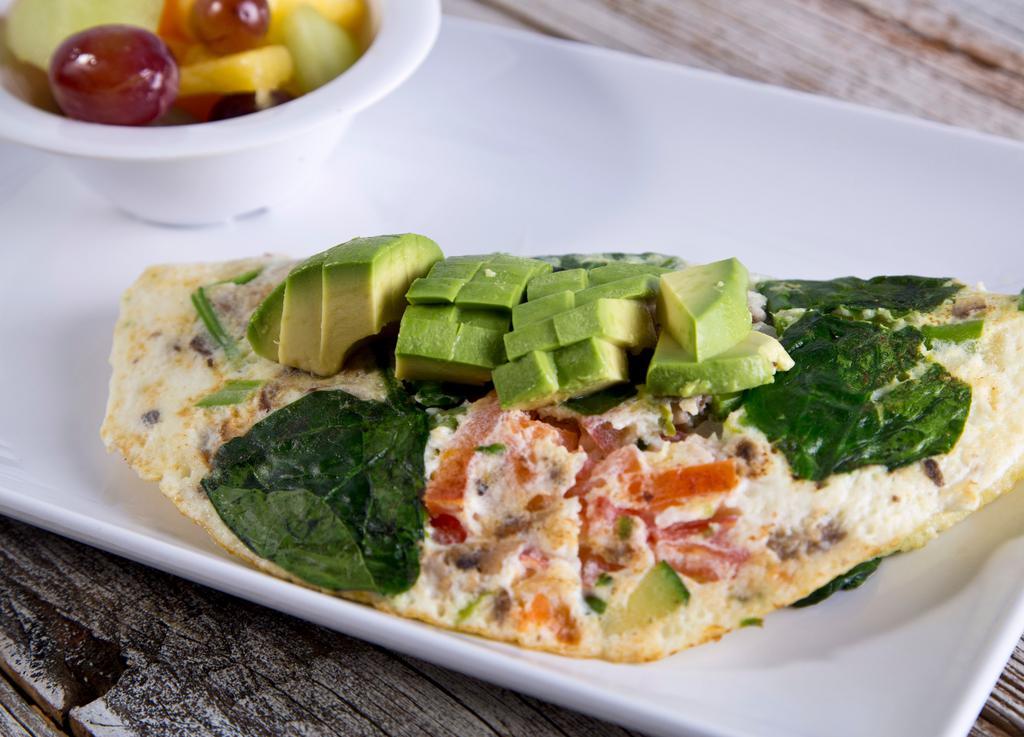 SHRDD Veggie Omelette · 6 egg whites, red peppers, red onions, spinach, broccoli, tomatoes, zucchini, asparagus, mushrooms, avocado served with a side of fruit. Gluten-free.