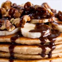 Chocolate Monster Pancakes · Non-GMO whole grain whey protein pancakes infused with dark chocolate chips and topped with ...