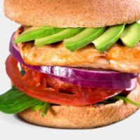 Salmon Burger · Sustainable salmon, spinach, onions, tomatoes, avocado, agave mustard.