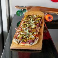 Pastrami Signature Signature Pie  · Pastrami, tomato sauce with peppers and onions, pickles, mustard finish.