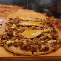 SiSig Pizza ·  Sisig recipe is for one of the most popular Filipino foods. Our pork sisig is made from boi...
