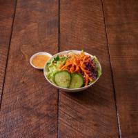 Tossed Green Salad · Romaine lettuce, carrots, red cabbage, cucumber and tomatoes.
