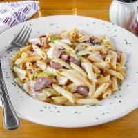 Pasta Jambalaya · Smoked sausage, chicken, onions, and green bell peppers, simmered in a roasted garlic cream ...