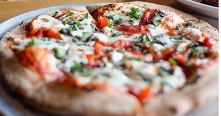 Veggie Pizza · Your choice of garlic sauce or tomato sauce, with mushrooms, onions, green peppers, green and black olives, and tomatoes.