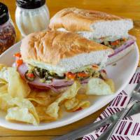 Muffaletta Sub · Special blend of olive salad, salami, ham and provolone cheese toasted on a fresh baked roll.