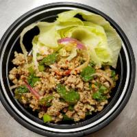 Larb Salad · Ground chicken or pork mixed with mint, red onion, green onion, cilantro, chili, ground rice...