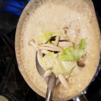 Tom Kha Soup · Thai coconut soup with coconut milk, galangal, lemongrass, kaffir lime leaves, lime juice, f...