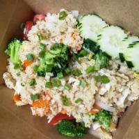Khao Pad Fried Rice · Stir-fried jasmine rice, eggs, Chinese broccoli, onion, carrot, tomato, and house soy sauce.