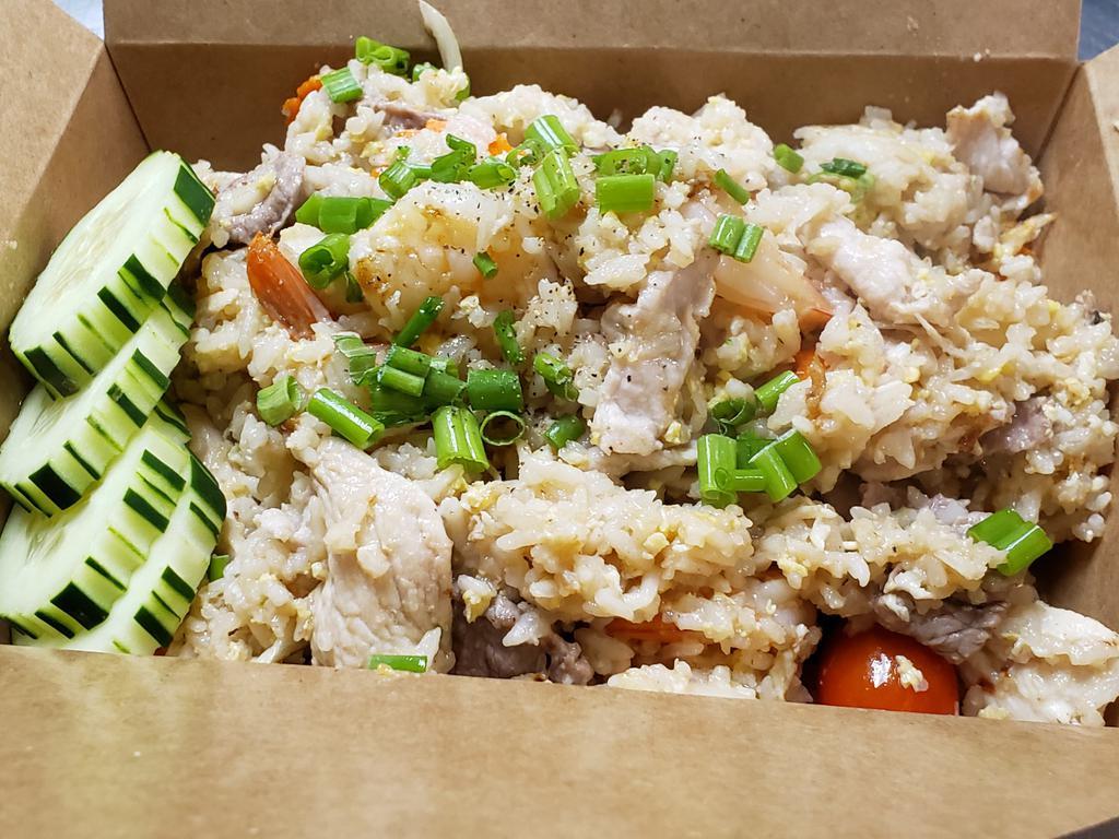 Chaiyo Fried Rice · Stir-fried jasmine rice, chicken, beef, pork, shrimp, eggs, onion, carrot, tomato, and house soy sauce.