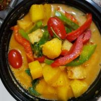Pineapple Curry · Red curry paste, pineapple, tomato, bell pepper, basil, and coconut milk.