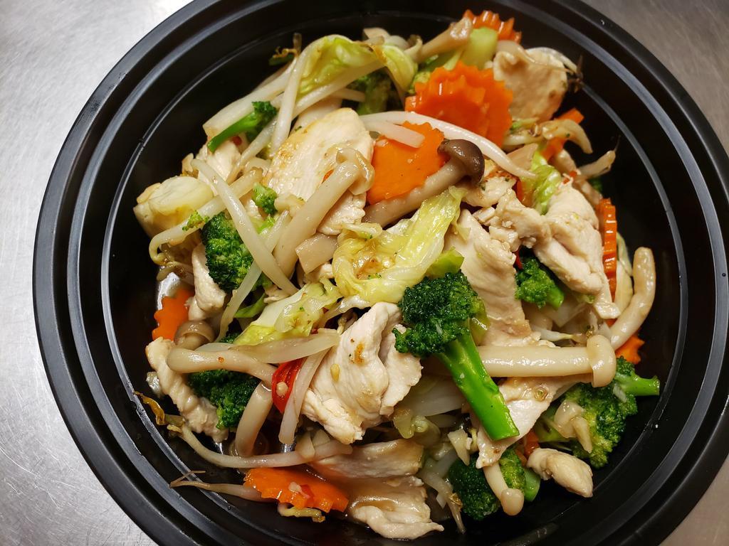 Pad Puck · Mix vegetable stir-fried with broccoli, carrot, zucchini, cabbage, mushroom, bean sprout and stir-fried sauce.