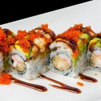 Dragon Maki · Shrimp tempura and crab stick with eel avocado & tobiko on the top with eel sauce.