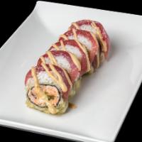 Red Sox Maki · Salmon scallions and cream cheese, deep fried in light batter, rolled with tuna topped by sp...