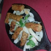 Chicken Sheek Kabab Appetizer · Ground chicken marinated in herbs and spiced with ginger, onion and other spices.
