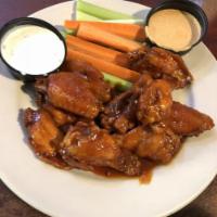 Blazing Brewhouse Wings Dinner · Jumbo wings deep-fried and tossed in our own BBQ (mild), tangy (medium), or zesty Cajun hot ...