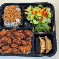 Chicken Karaage Box · Chicken Karaage don with miso soup, house salad, Beef Gyoza, Crunch California Roll