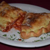 Baked Cheese Panzerotti · Our delicious pizza dough stuffed with your choice of fresh ingredients.