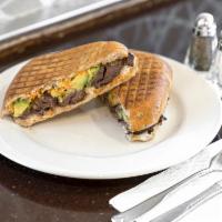 Steak Avocado Panini · Grilled skirt steak, avocado, fresh mozzarella with red pepper aioli.