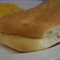 Coco Bread · A Caribbean staple bread baked with coconut milk and slightly sweet. It is often eaten stuff...