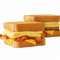 Breakfast TOASTER® · Your choice of Sausage or Bacon, fluffy egg, and American Cheese served on Thick Texas Toast.