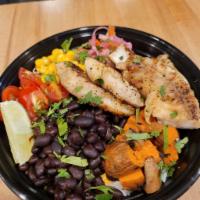 Mestizo Rice Bowl (GF) · Your choice of protein, rice pilaf, yams, beans, corn, tomatoes, pikliz, cilantro, and lime ...
