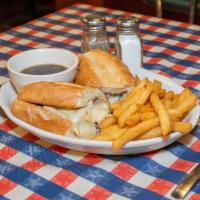 French Dip Sandwich · Tender slices of roast beef topped with mozzarella cheese on a steak roll. Served with au jus.