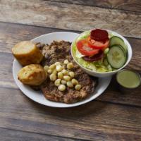 Churrasco · Grilled Chuck steak served with golden potatoes and  salad